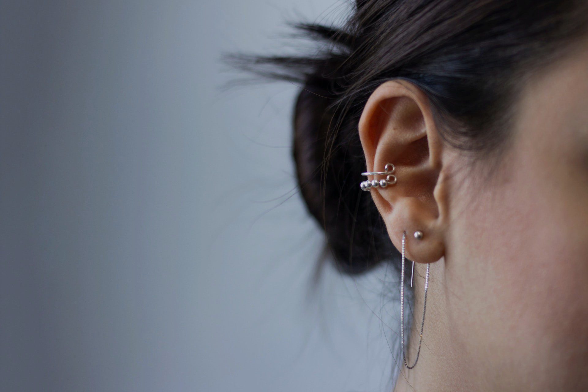 Closeup of a woman's ear with an external ear infection