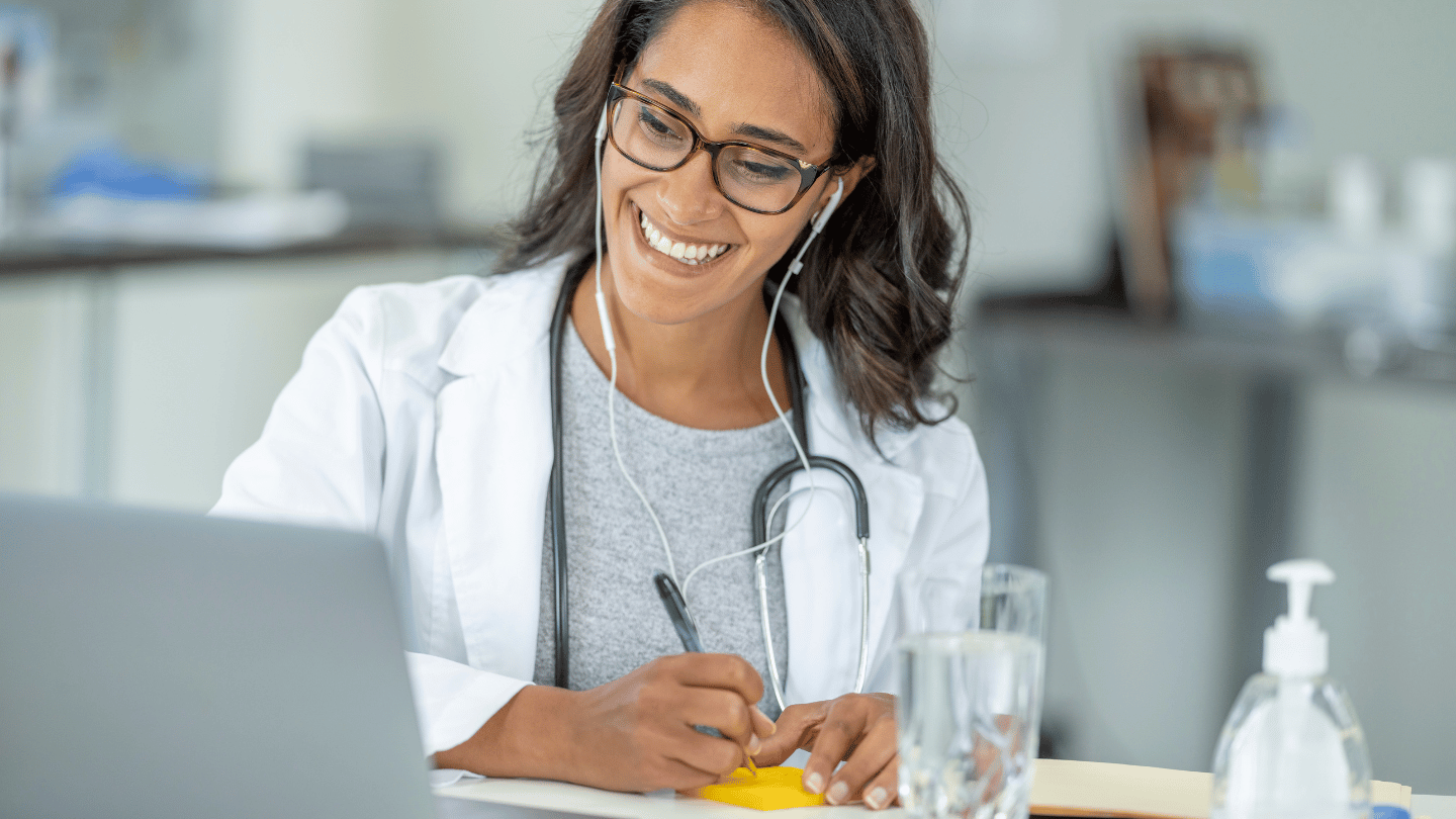 Doctor helping a patient via telemedicine services online