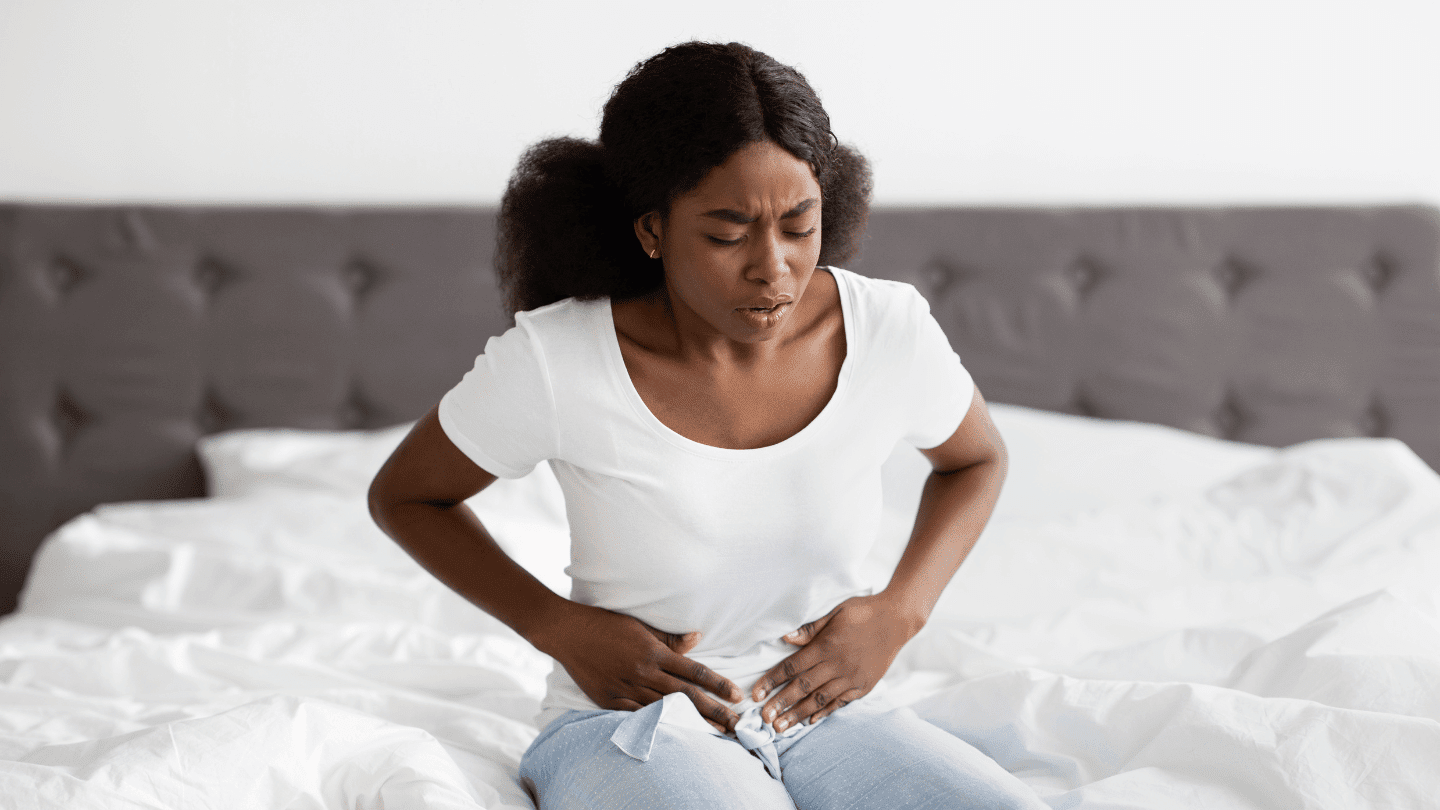 Woman with morning sickness symptoms