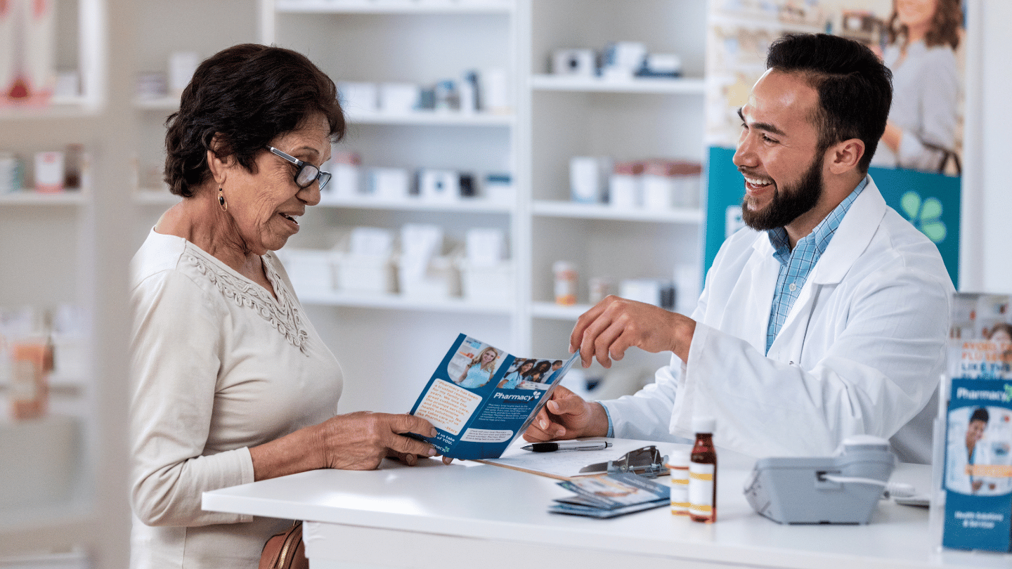 Pharmacist explaining the concept of an Ozempic generic, compounded semaglutide, to a female customer