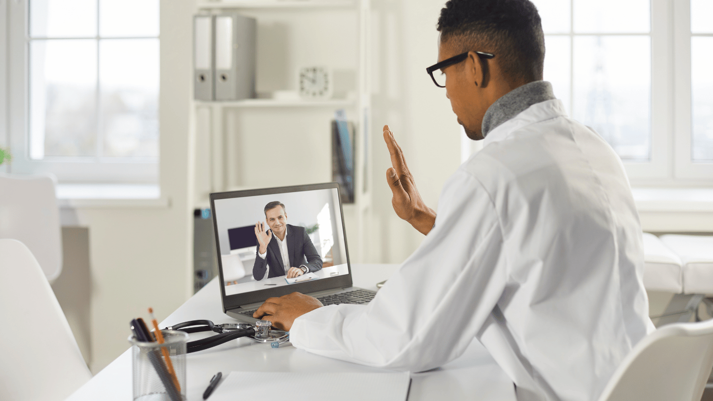 Doctor conducting an online Suboxone consultation via telemedicine, highlighting convenient and effective opioid addiction treatment options available at QuickMD