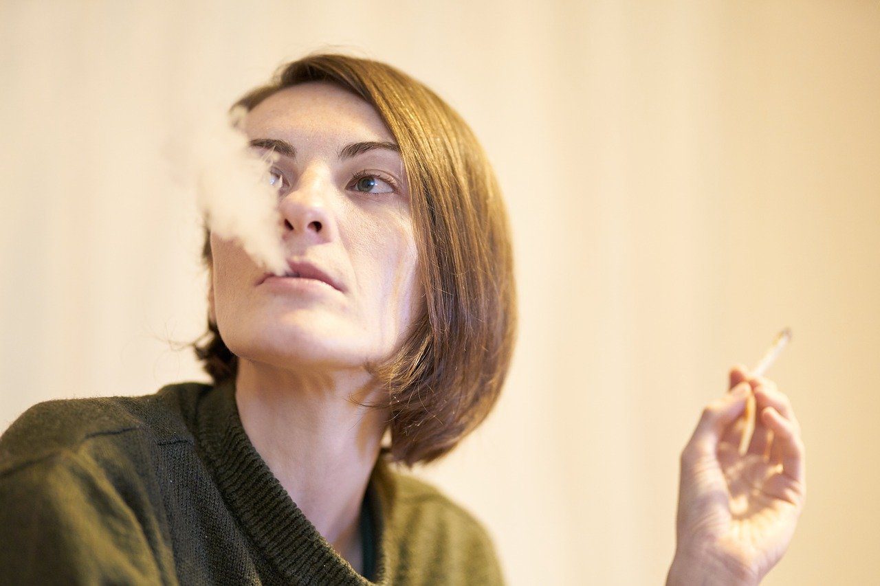 Woman with chronic obstructive pulmonary disease smoking