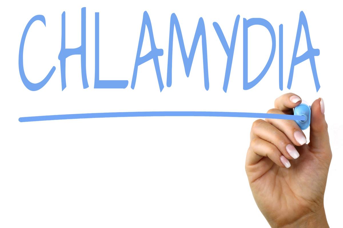 Person writing chlamydia