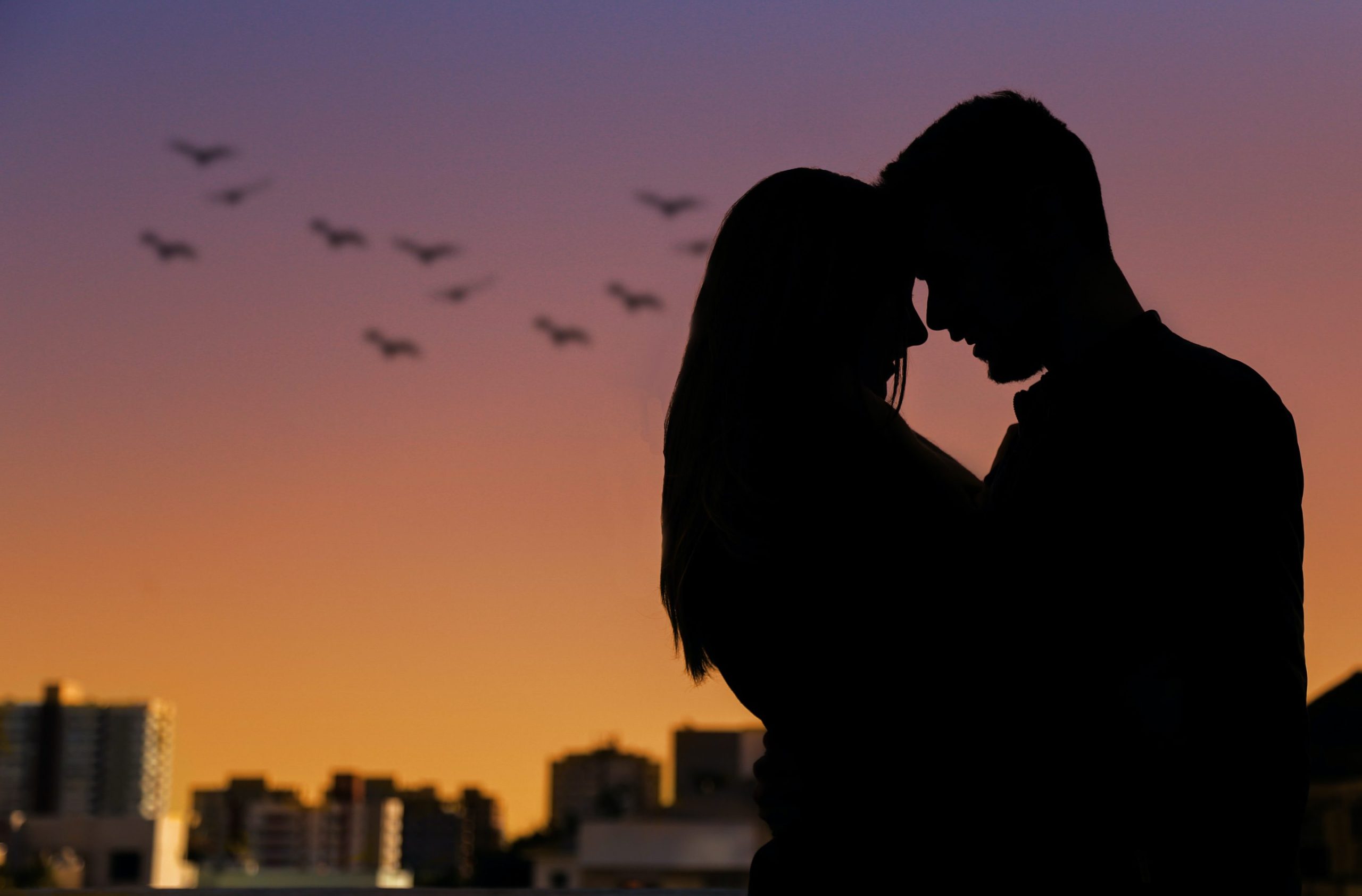 A couple embracing safely to prevent Monkeypox spread